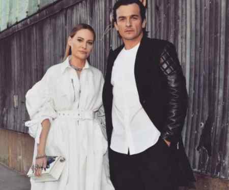 Rupert Friend with his spouse